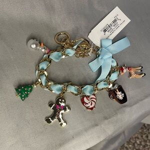 NWT Betsey Johnson Gold Bracelet with Blue Bow and Holiday Charms